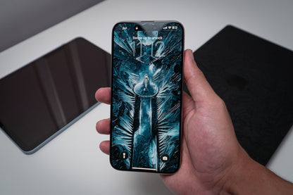 Icy blue figure with blade, wallpaper on an iPhone lock screen, held in hand