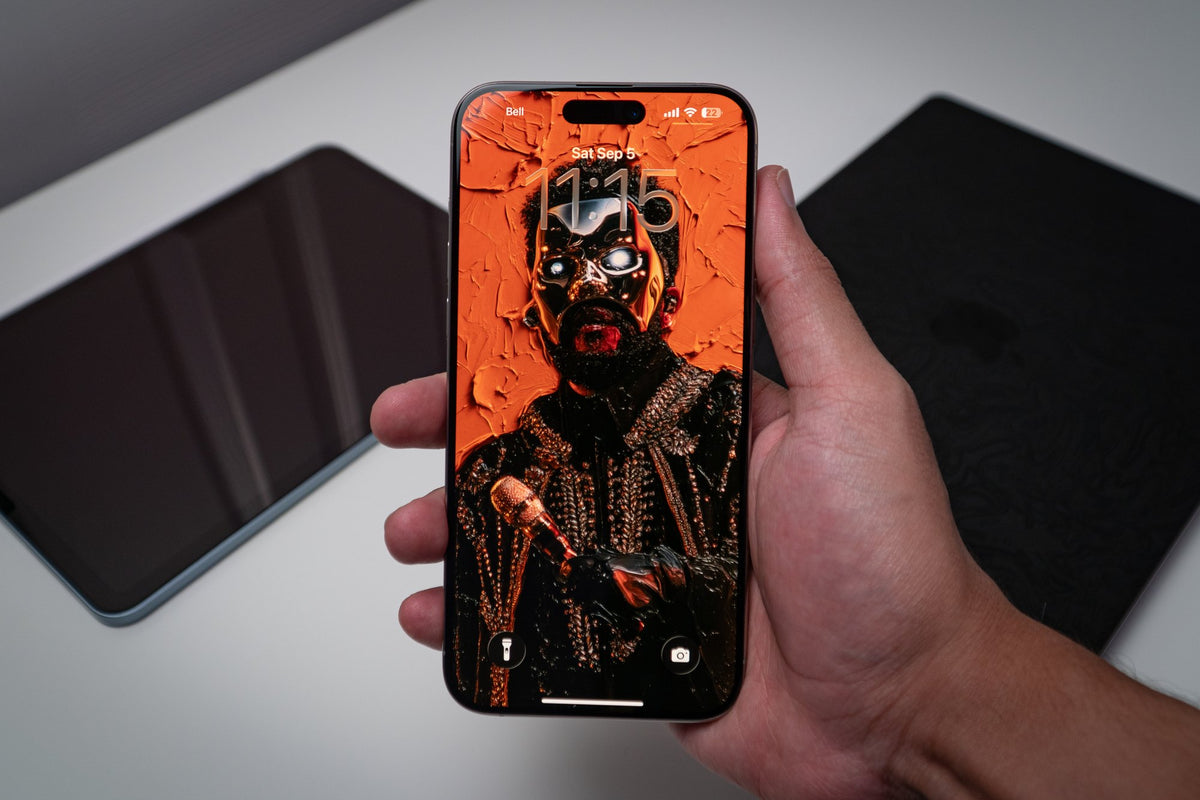 Cracked-impasto portrait on orange, wallpaper on an iPhone lock screen