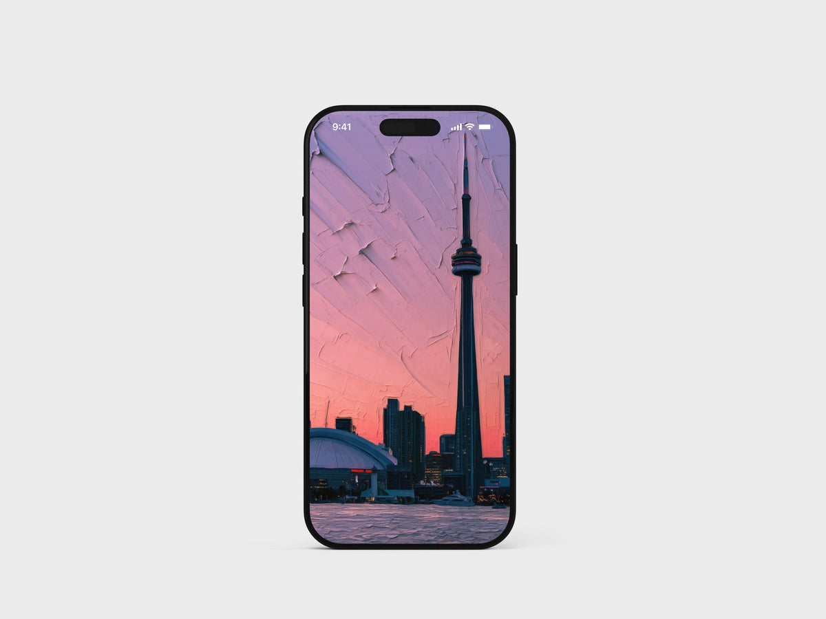 CN Tower against a pink sunset skyline on an iPhone